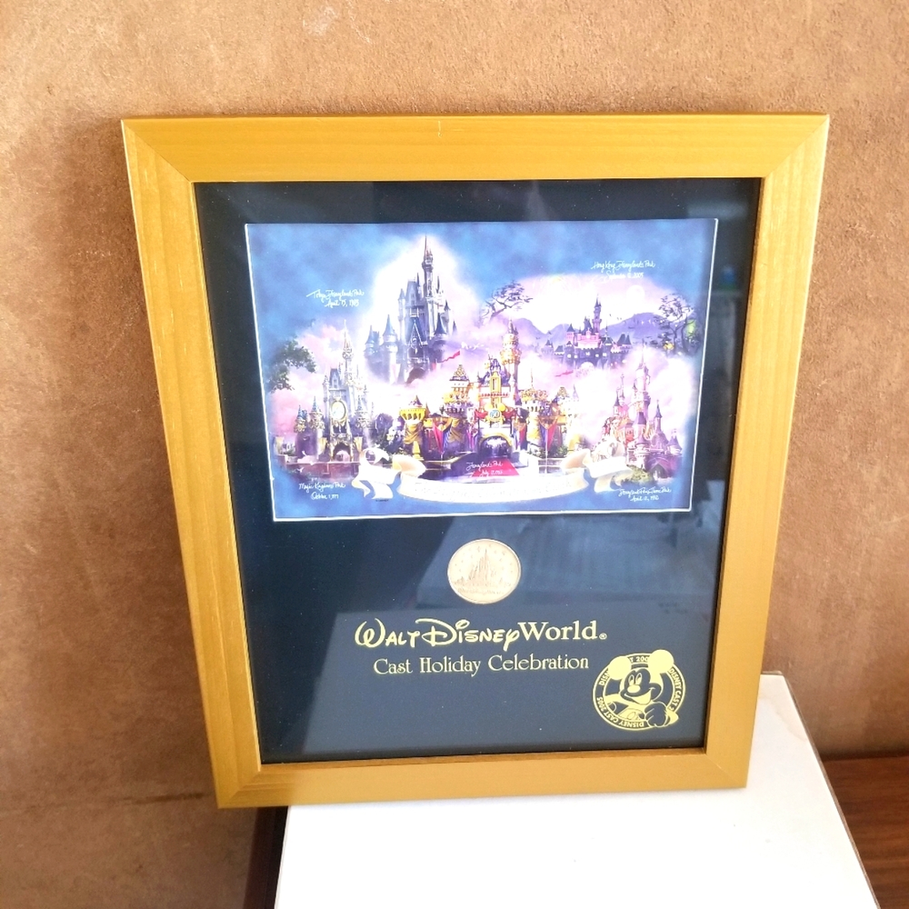 Walt Disney world  2005  cast holding celebration picture and framed coin  9x11